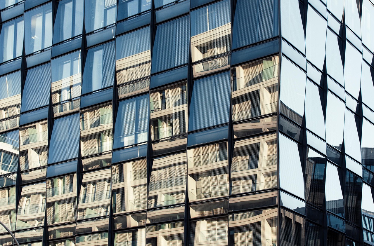 Building, structure, glass — Transform Your Productivity: The Science of Optimal Office Workstations